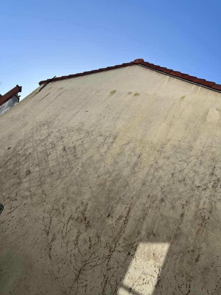 fissuration généralisée infiltrante enduit ciment mur pignon mitoyenneté